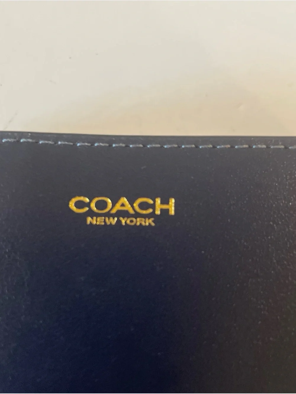 Coach compact zip